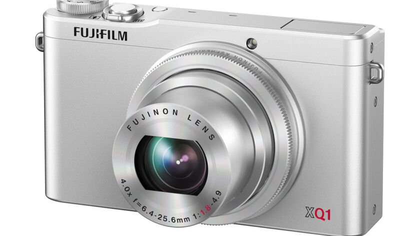 The Fujifilm XQ1camera in silver